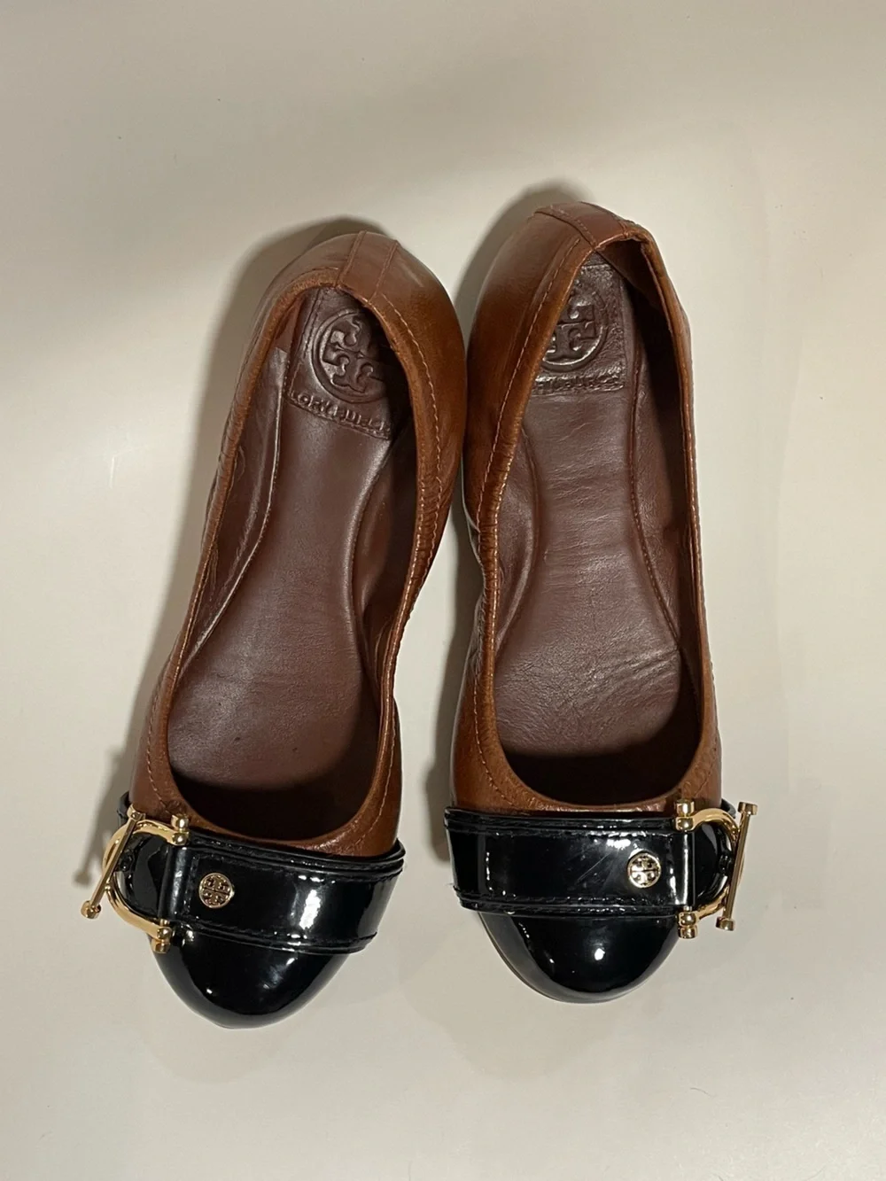 Tory Burch caps women’s